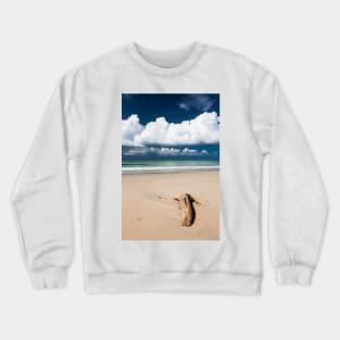 Beach driftwood and dark blue sky Crewneck Sweatshirt